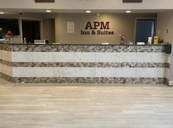 Apm Inn & Suites